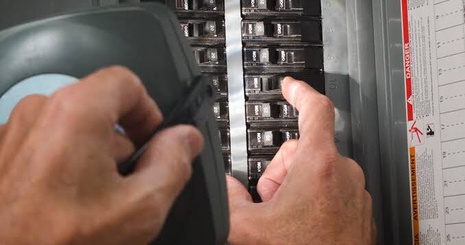 100-200 amp Technician repairing circuit breaker