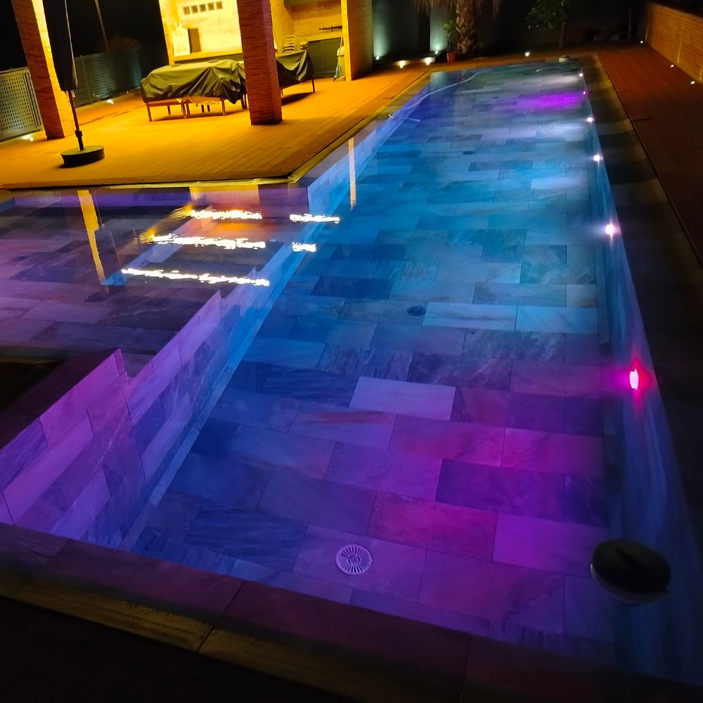 A swimming pool in Philadelphia, PA with advanced underwater lighting configurations.